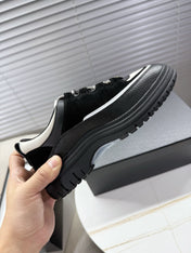 CHANEL 25S SNEAKERS 35MM IN BLACK AND WHITE CALFSKIN