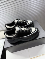 CHANEL 25S SNEAKERS 35MM IN BLACK AND WHITE CALFSKIN