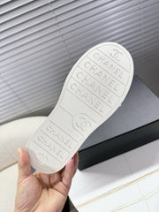 CHANEL 25S TRAINERS WHITE AND BLACK 35MM IN CALFSKIN