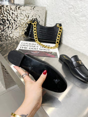 PRADA 26S MULE LOAFERS IN BLACK CALFSKIN WITH LOGO