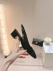 SLINGBACKS IN BLACK SHEEPSKIN