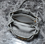 BV SMALL ANDIAMO 25CM GREY LAMBSKIN