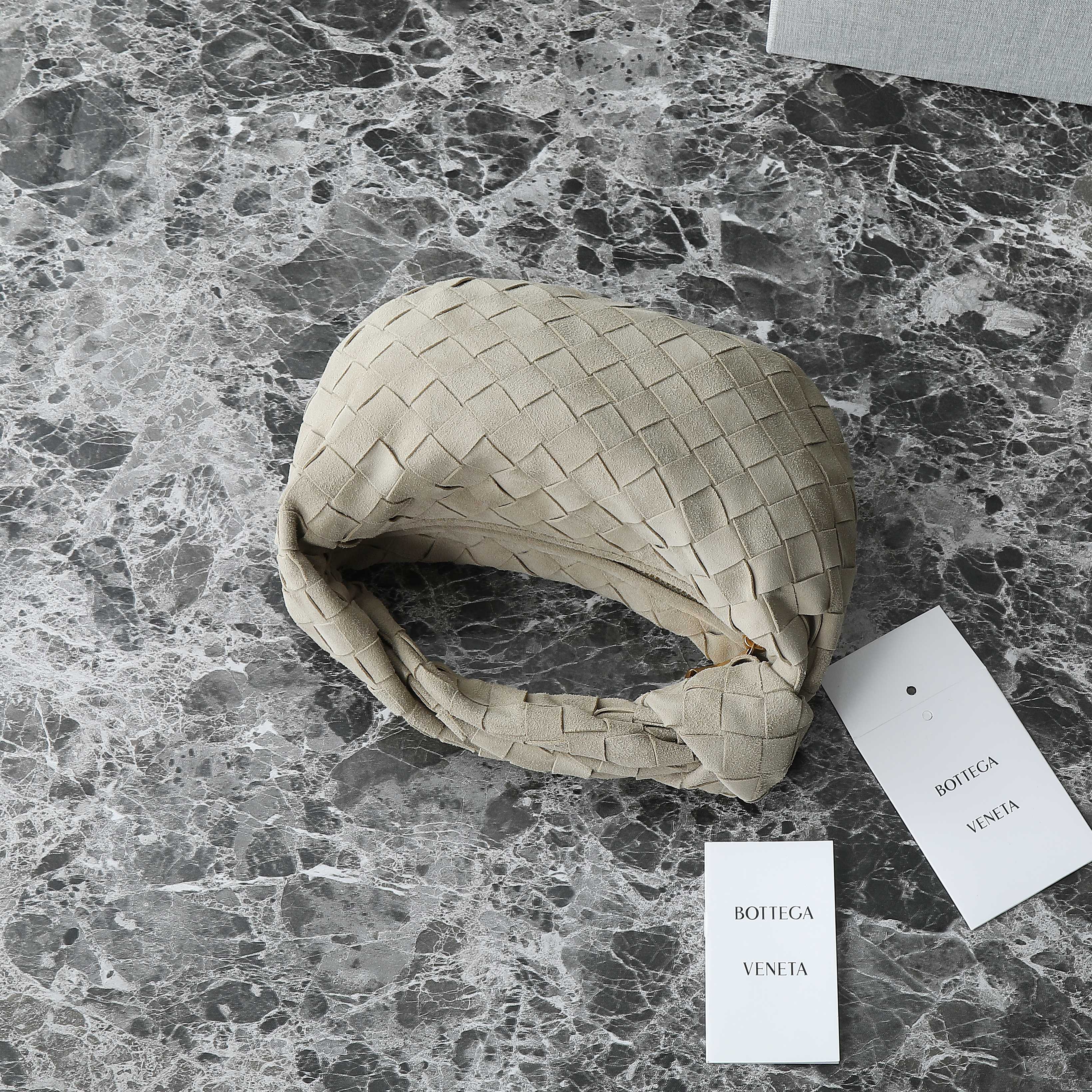 BOTTEGA VENETA 25S MINI JODIE 28 IN MUTED TAUPE SUEDE GOLD HARDWARE