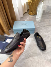 PRADA 25S LOAFERS IN BLACK CALFSKIN