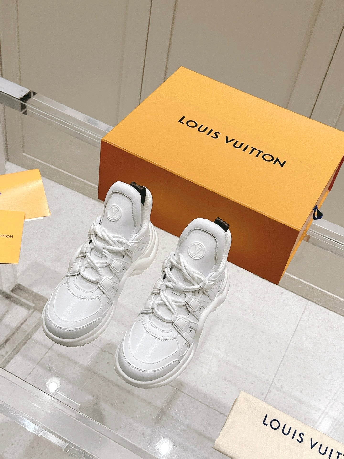 LV BARRACUDA SNEAKER IN WHITE CALFSKIN