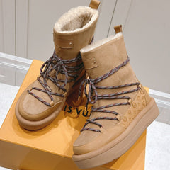 ASPEN PLATFORM ANKLE BOOT IN CIDER BROWN MONOGRAM DEBOSSED SUEDE AND SHEARLING