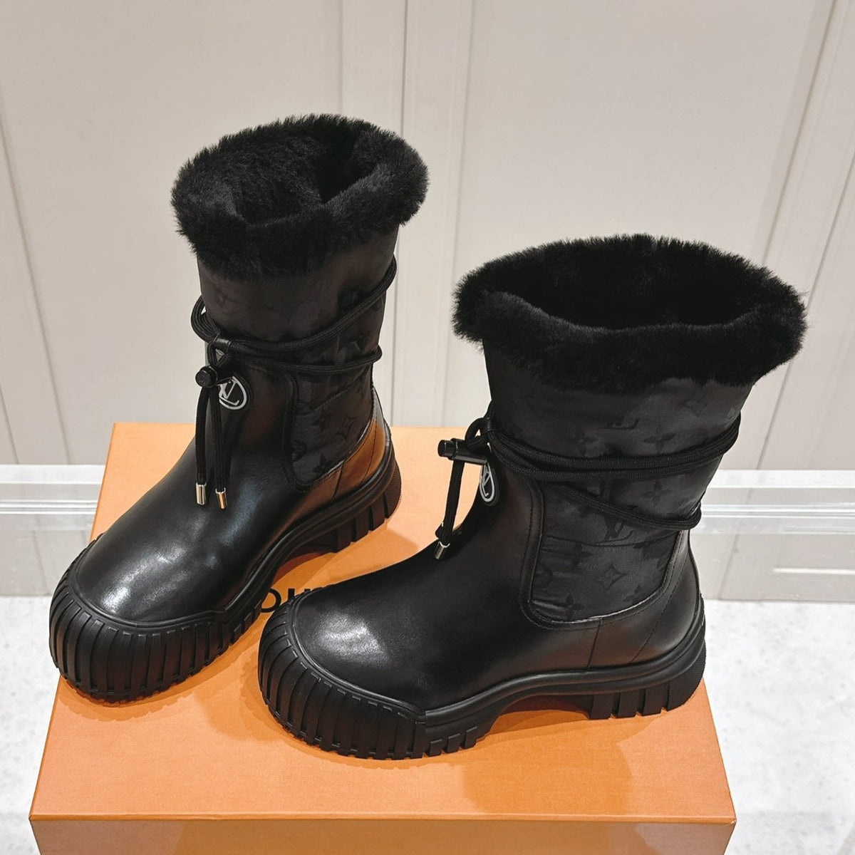 RUBY FLAT ANKLE BOOT IN BLACK CALFSKIN AND MONOGRAM NYLON