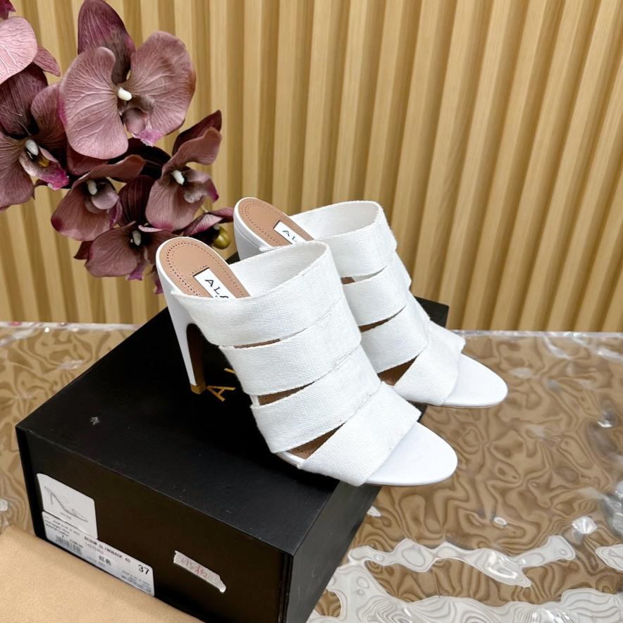 ALAIA ELASTIC CAGE MULE SANDALS IN WHITE WOVEN STRAP AND LAMBSKIN