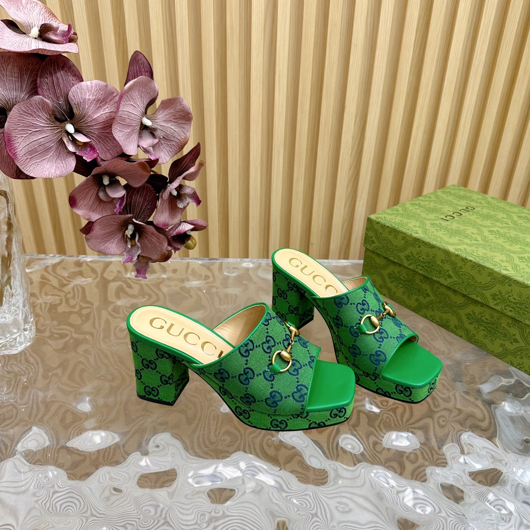 HORSEBIT SLIDE SANDAL IN FOREST GREEN MONOGRAM CANVAS AND SHEEPSKIN LINING