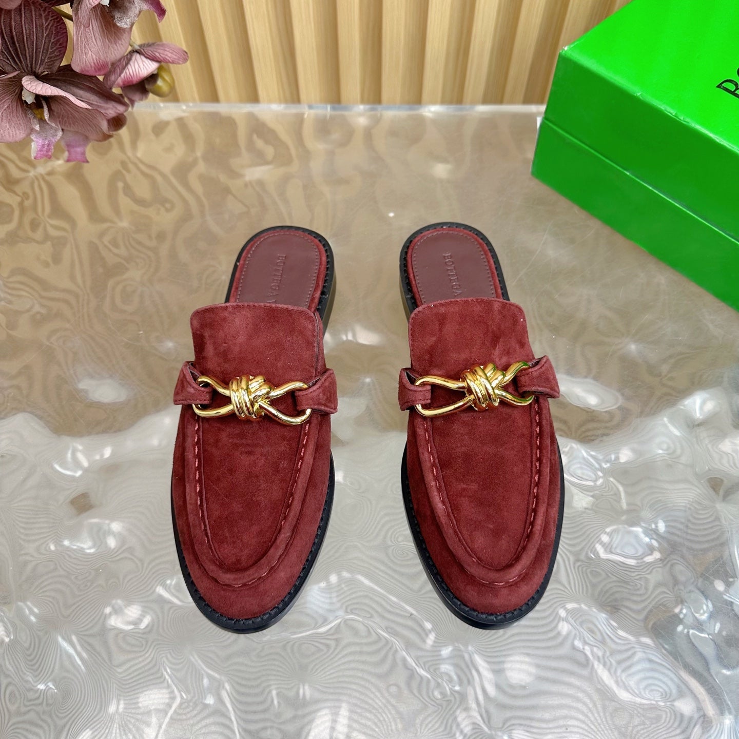 OPEN-BACK LOAFER REALISED IN GARNET RED SUEDE WITH SIGNATURE METALLIC KNOT DETAIL