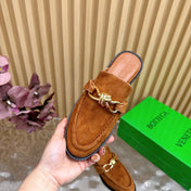 OPEN-BACK LOAFER REALISED IN CINNAMON BROWN SUEDE WITH SIGNATURE METALLIC KNOT DETAIL