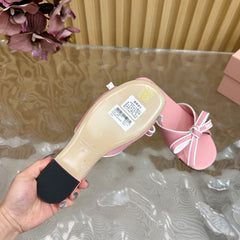 SLIDES SANDALS IN PINK CALFSKIN WITH BOW IN TRAP