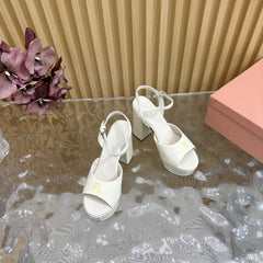 PLATFORM HEELS IN WHITE PATENT CALFSKIN GOLD LOGO IN STRAP