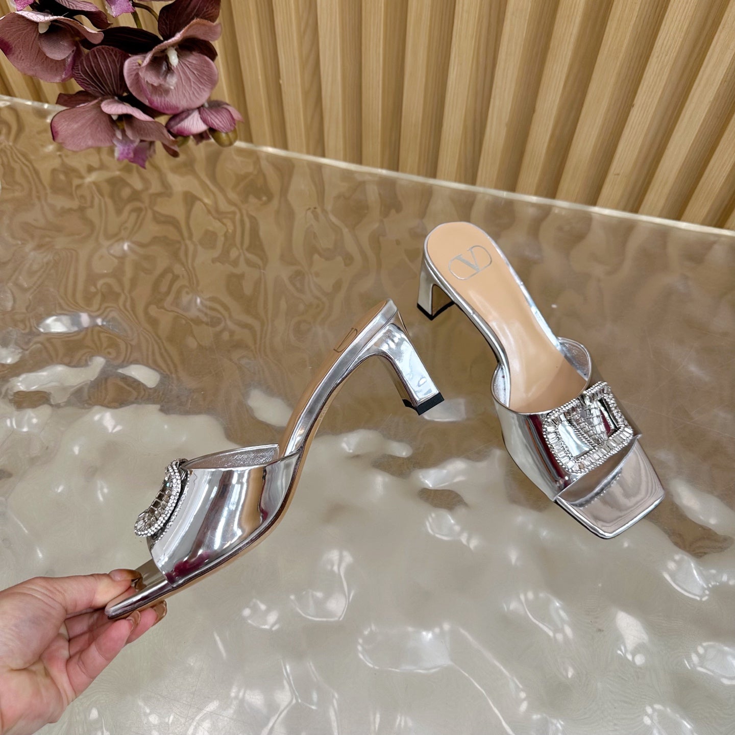 VALENTINO 25S HIGH-HEEL MULES 60 MM IN SILVER PATENT CALFSKIN WITH CRYSTAL-EMBELLISHED STRAP