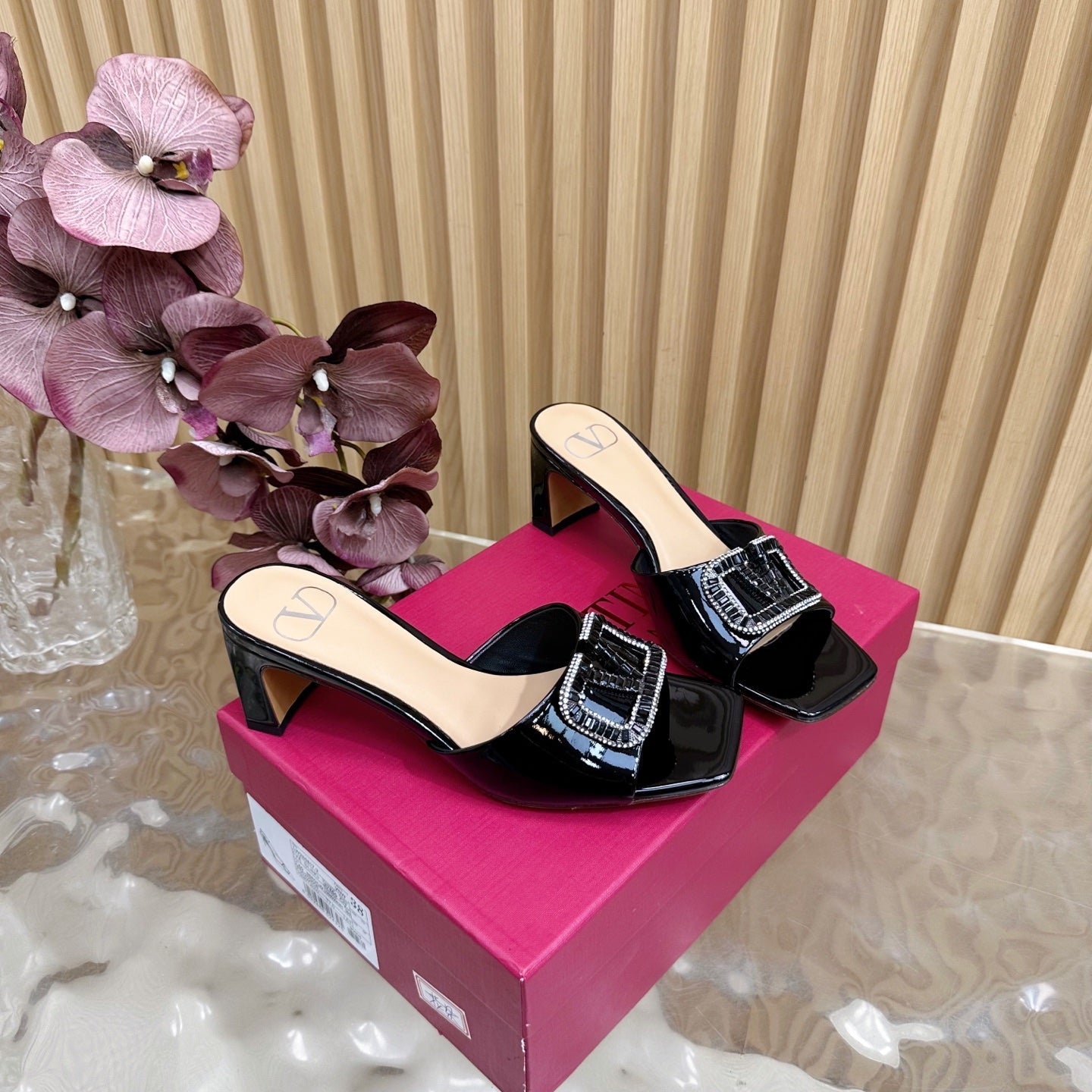 VALENTINO 25S HIGH-HEEL MULES 60 MM IN BLACK PATENT CALFSKIN WITH CRYSTAL-EMBELLISHED STRAP