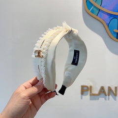 WHITE FABRIC WITH GOLD LOGO HAIRBAND 410841