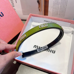 HEAD BAND IN OLIVE GREEN LAMBSKIN AND RESIN 417298