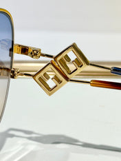 TRAVEL ROUND FRAME SUNGLASSES FD8136 IN METAL