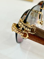 PANTHÈRE RIMLESS TRIANGLE FRAME SUNGLASSES CT0616S IN METAL AND WOODEN