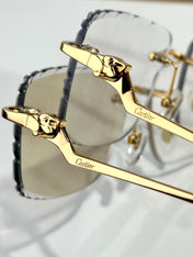 PANTHÈRE PHOTOCHROMIC LENSES RIMLESS SQUARE FRAME SUNGLASSES 580910 IN METAL