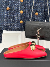 ALAIA FLAT MULE IN CRIMSON RED LAMBSKIN WITH GOLD HARDWARE