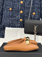 ALAIA FLAT MULE IN BRONZE BROWN LAMBSKIN WITH GOLD HARDWARE