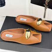 ALAIA FLAT MULE IN BRONZE BROWN LAMBSKIN WITH GOLD HARDWARE
