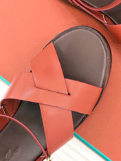 SANDALS THICK SOLE CROSS STRAP IN BURNT ORANGE AND BROWN CALFSKIN