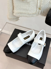 FLAT SHOES IN BLACK AND WHITE LAMBSKIN GOLD HARDWARE