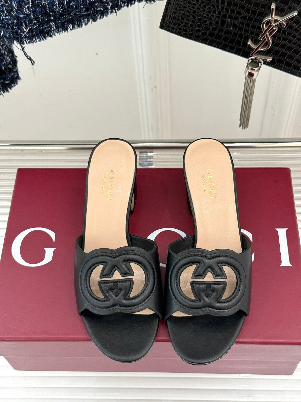 MID-HEEL MULE IN BLACK CALFSKIN