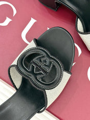 MID-HEEL MULE IN BLACK CALFSKIN AND CREAM WHITE FABRIC