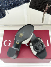 MID-HEEL MULE IN BLACK CALFSKIN AND CREAM WHITE FABRIC