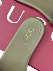 SLIDE SANDALS IN MOSS GREEN CALFSKIN WITH GOLD HARDWARE