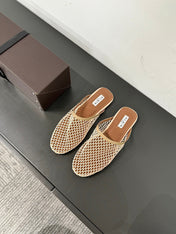 ALAIA FLAT MULES IN BEIGE MESH FISHNET
