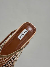 ALAIA FLAT MULES IN BEIGE MESH FISHNET