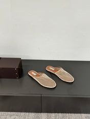 ALAIA FLAT MULES IN BEIGE MESH FISHNET
