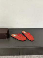 ALAIA FLAT MULES IN CHERRY RED MESH FISHNET