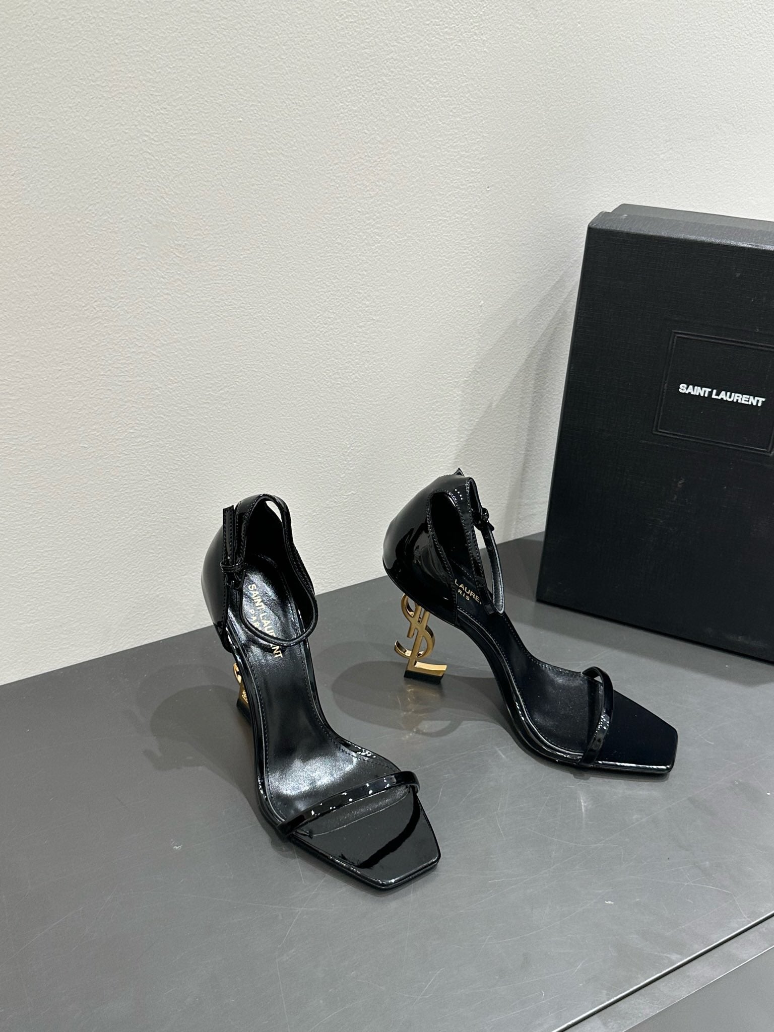 YSL HEELED SANDALS 25S 105 MM IN BLACK GLOSSY LAMBSKIN WITH GOLD HARDWARE