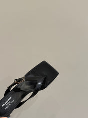 BALENCIAGA 25S HIGH-HEELED FLIP-FLOPS IN BLACK CALFSKIN WITH SILVER HARDWARE