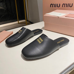 MULES SLIPPERS RETRO BLACK COWHIDE