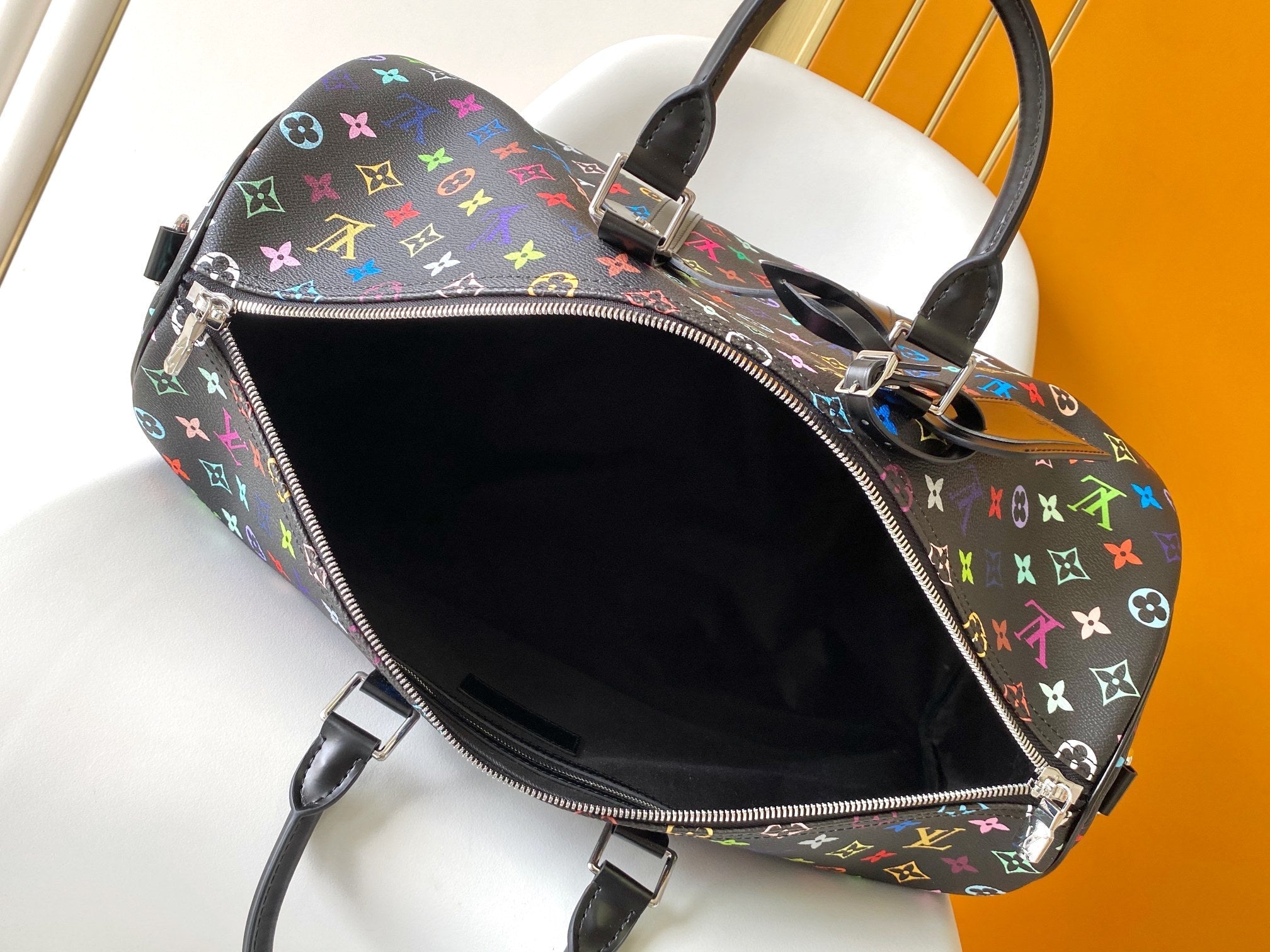 KEEPALL BANDOULIÈRE 50 BAG IN MULTICOLORED MONOGRAM COATED CANVAS