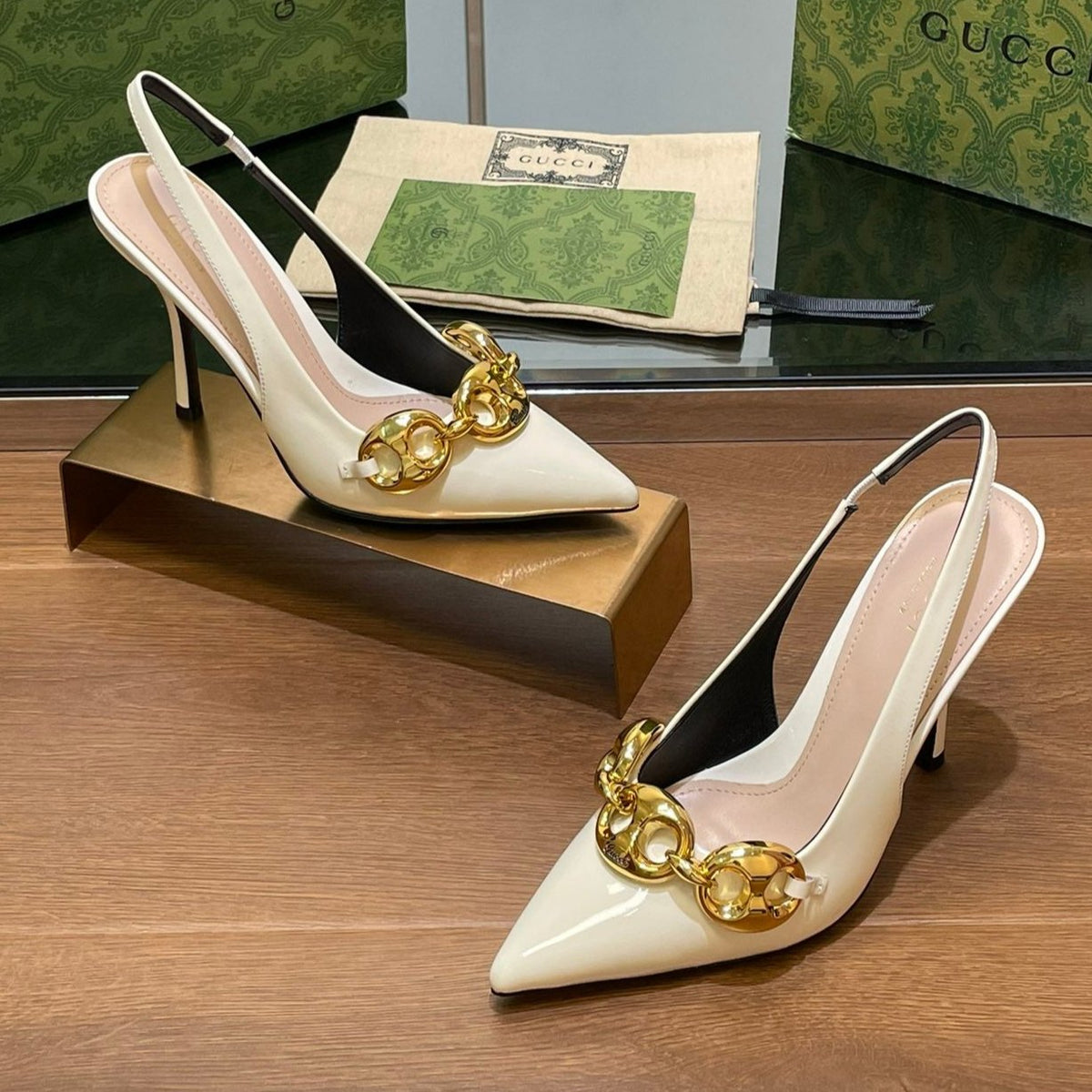 GG HIGH SLINGBACK 10.5 CM IN WHITE GLOSSY CALFSKIN WITH GOLD HARDWARE