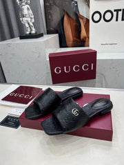 GG CASUAL SLIPPERS IN BLACK CALFSKIN LOGO EMBOSSING
