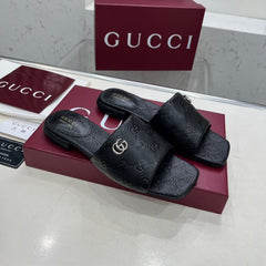 GG CASUAL SLIPPERS IN BLACK CALFSKIN LOGO EMBOSSING