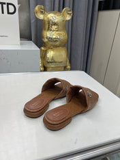 GG CASUAL SLIPPERS IN BROWN CALFSKIN LOGO EMBOSSING