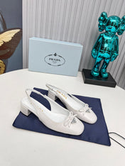 PRADA 26S ROUND TOE SLINGBACK PUMPS 40MM IN WHITE CALFSKIN WITH BOW