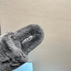 THICK-SOLED FUR SLIDES GRAY WITH TRIANGLE LOGO