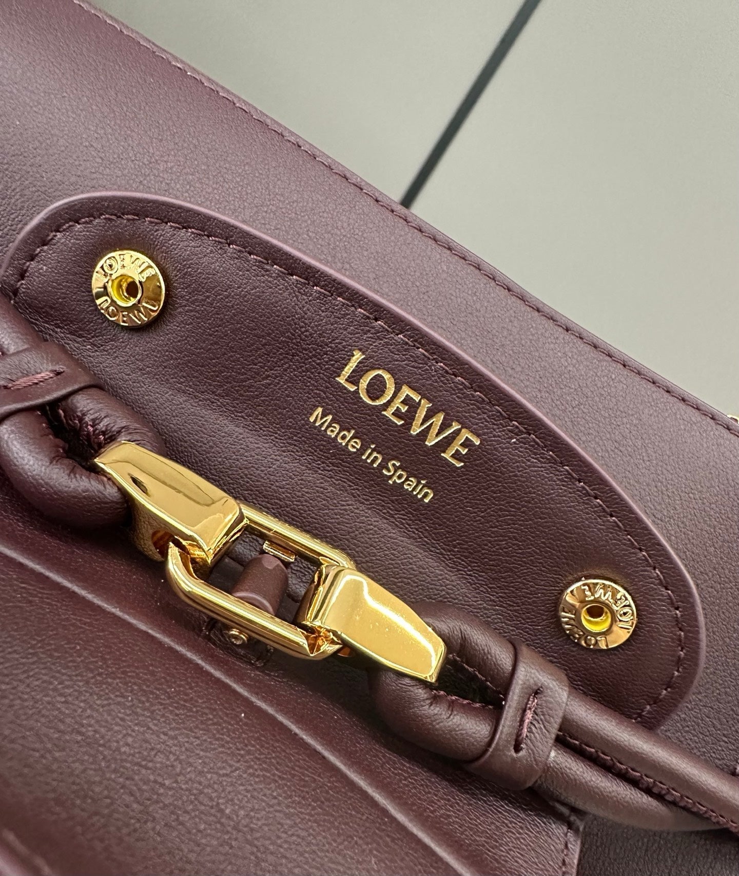 LOEWE 25S MADRID BAG 28 IN DARK WINE CALFSKIN GOLD HARDWARE
