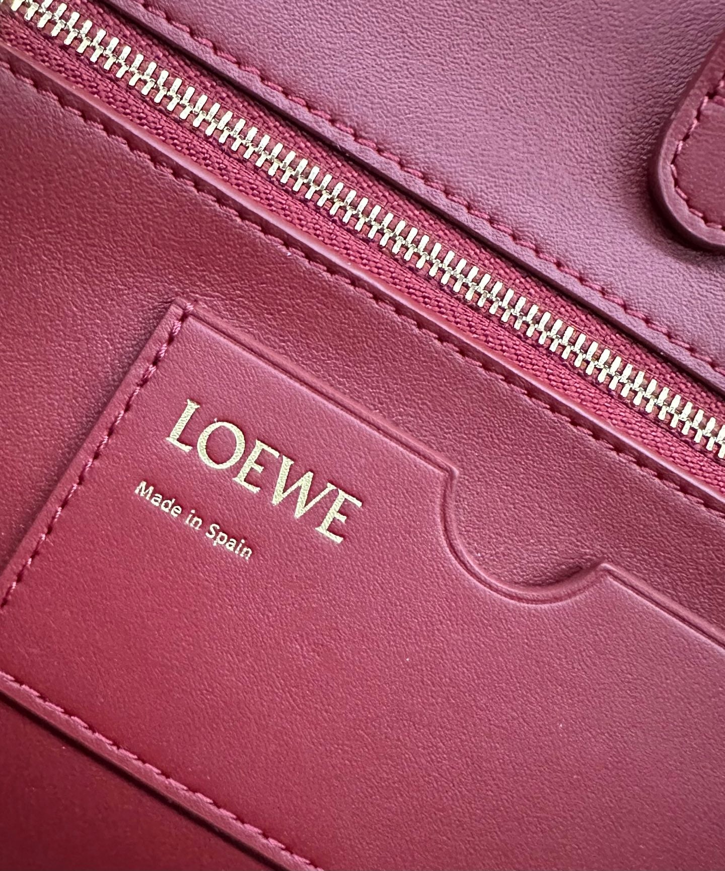 LOEWE 25S MADRID BAG 28 IN CHERRY RED CALFSKIN GOLD HARDWARE