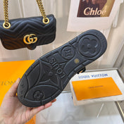 LV WOMEN'S COSY FLAT COMFORT CLOGS IN BLACK MONOGRAM SUEDE